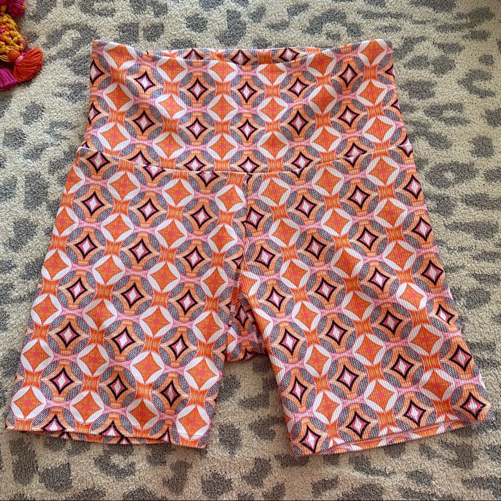 Free people onzie geometric orange biker shorts